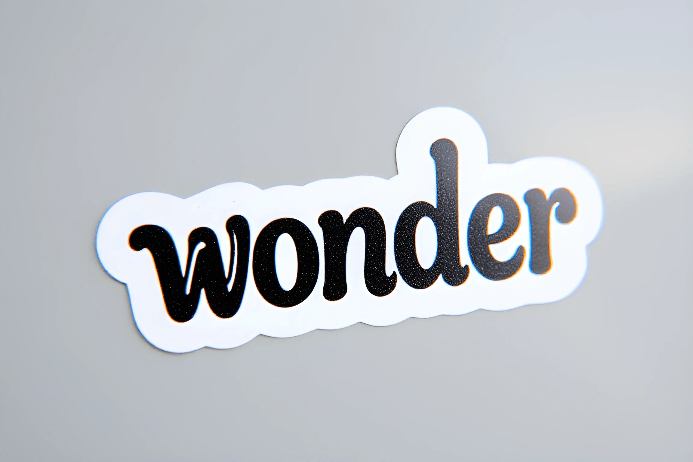Wond Sticker Wonder Word Sticker On Gray Surface - Free Download - AI Scribbles
