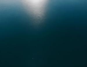 Aerial View of Deep Blue Ocean Water - Free Download - AI Scribbles